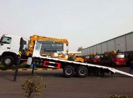 Эвакуатор с КМУ XCMG SQS157-4 на шасси ISUZU 6x4